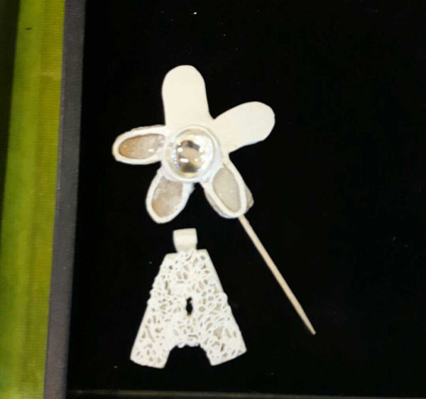 Large filligree flower with glass marble pendent